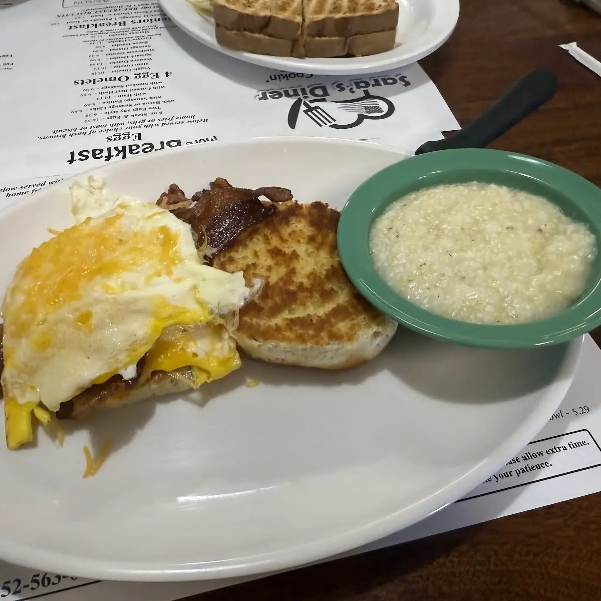 Bacon Egg Cheese Biscuit and Grits