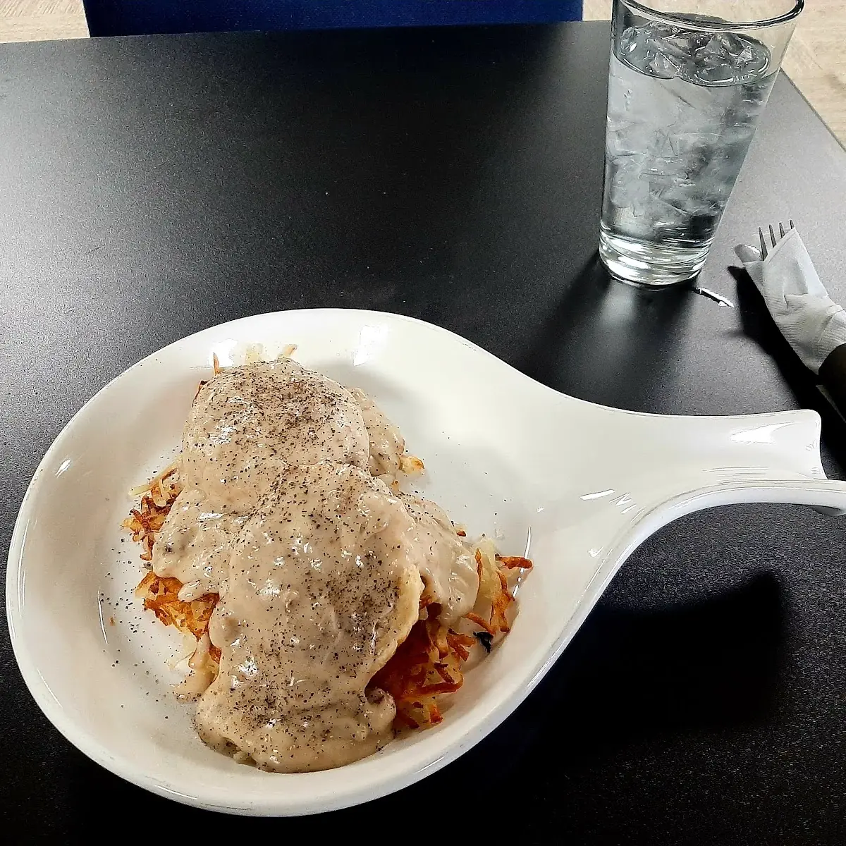 1 2 Order Biscuits and Gravy on Hashbrowns
