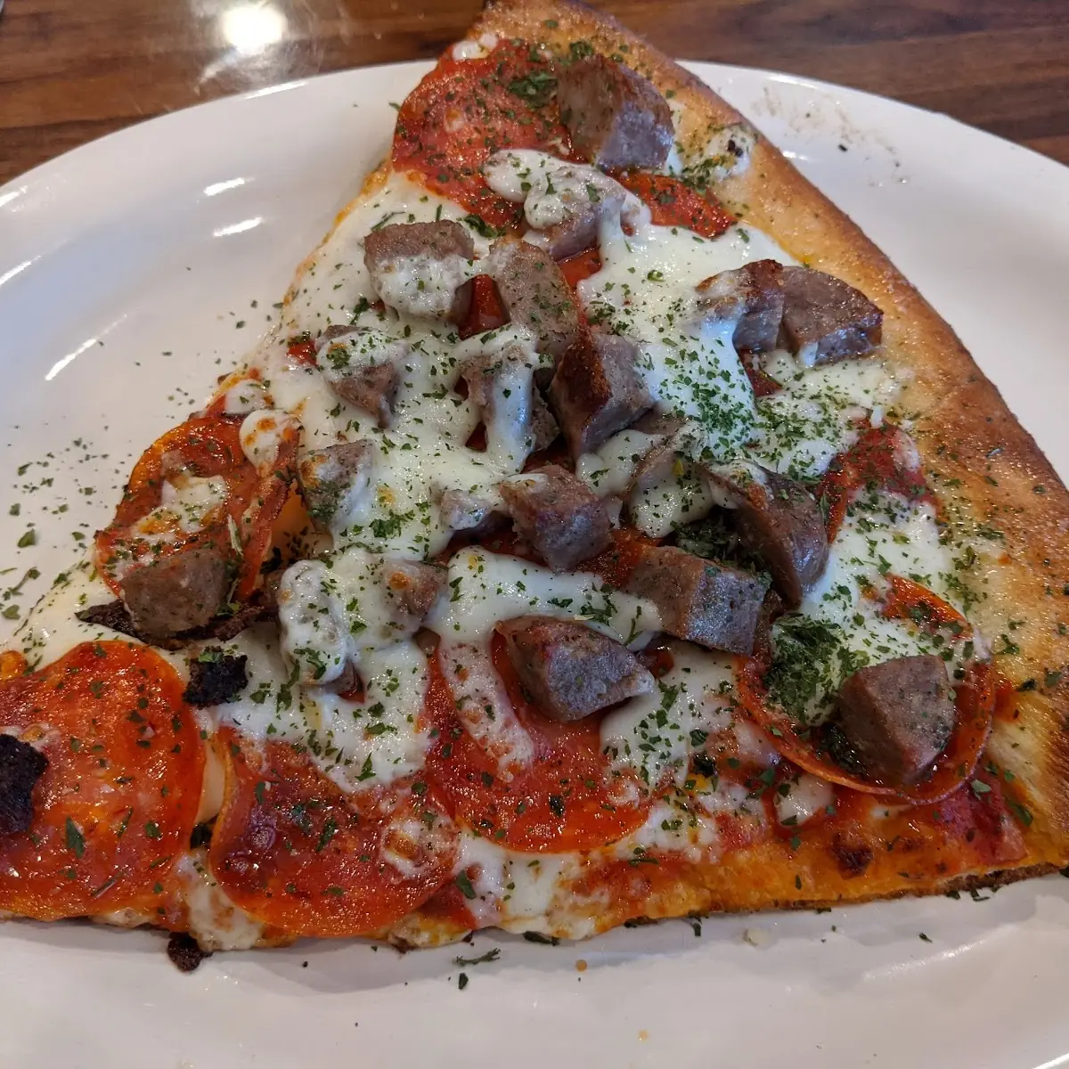 Sausage and Pepperoni Pizza Slice Is so Nice