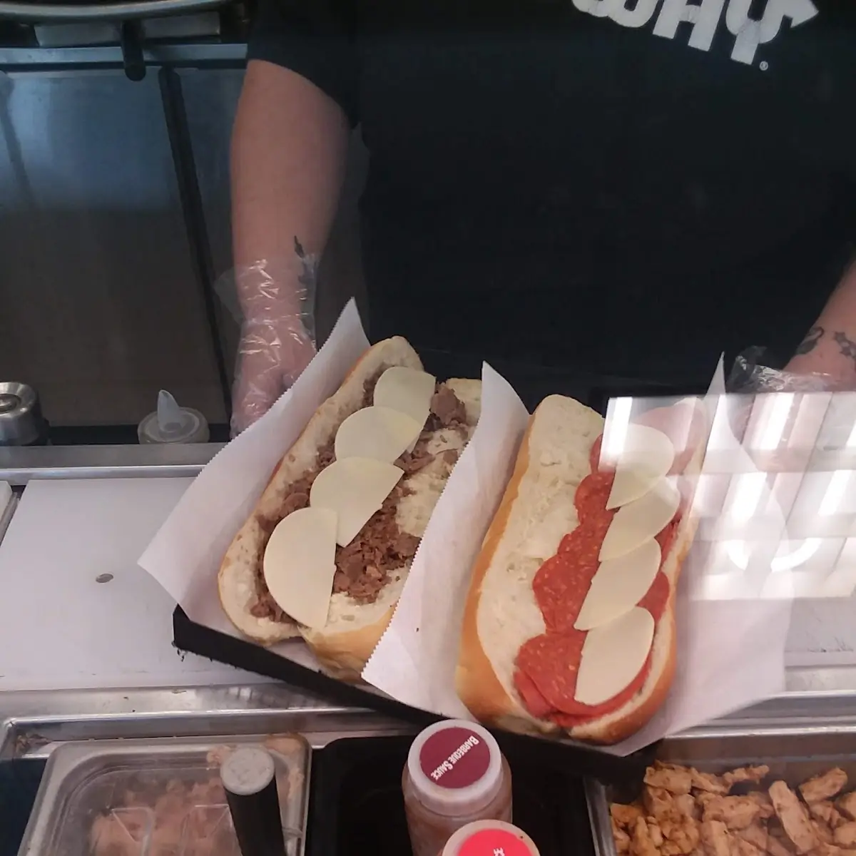 A Steak and Cheese and a Pepperoni and Cheese Sub