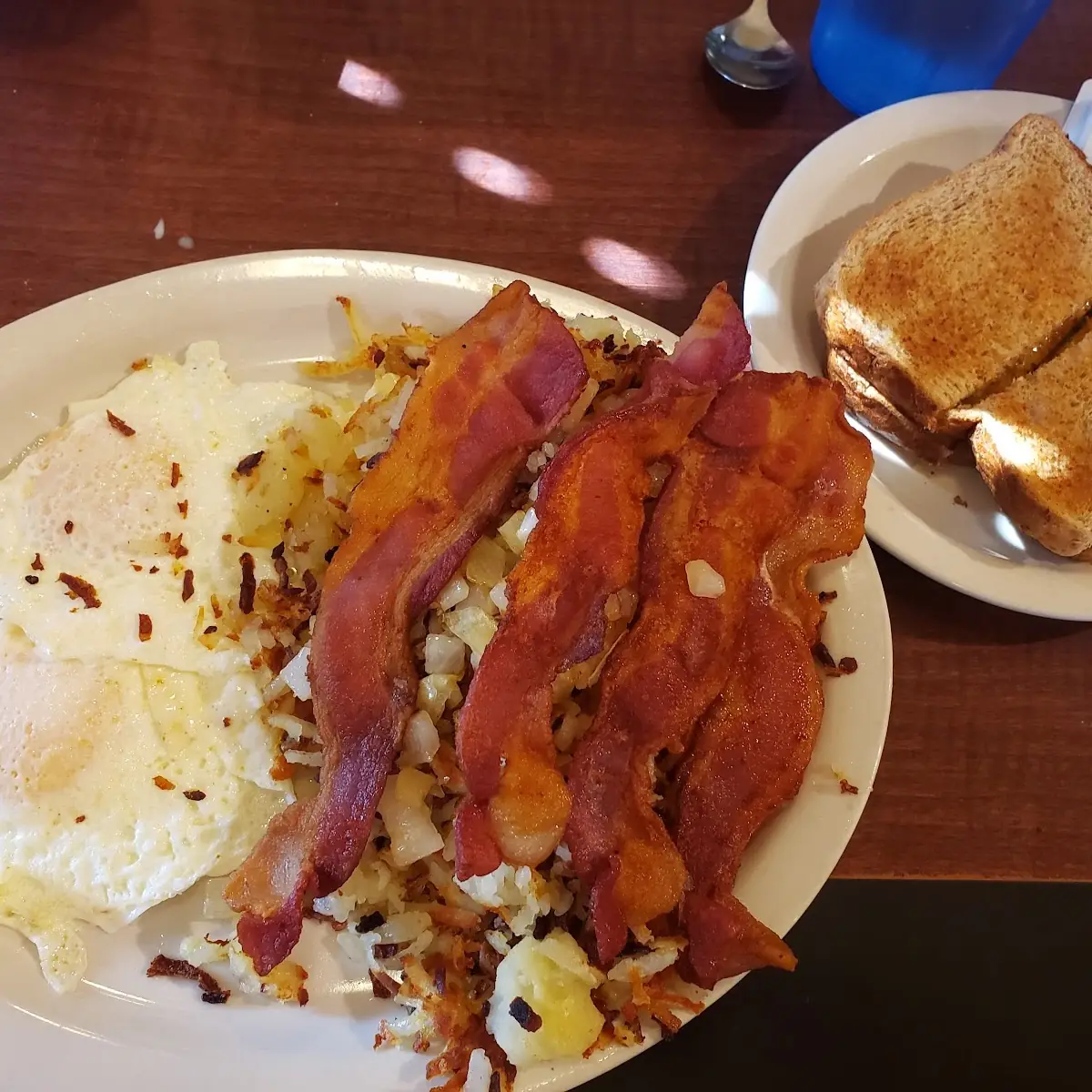 Eggs over Medium Hash Browns Well Done Bacon