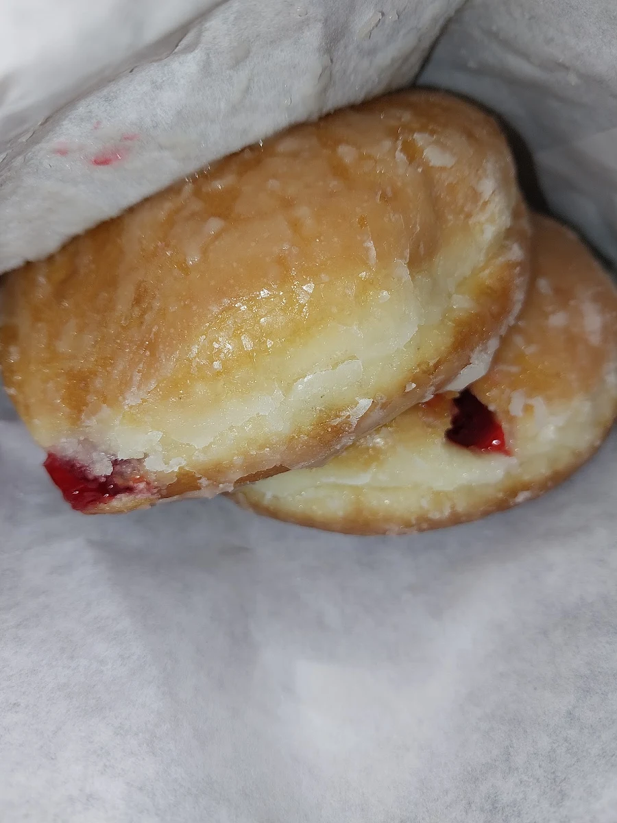 Raspberry Filled Glazed Donuts