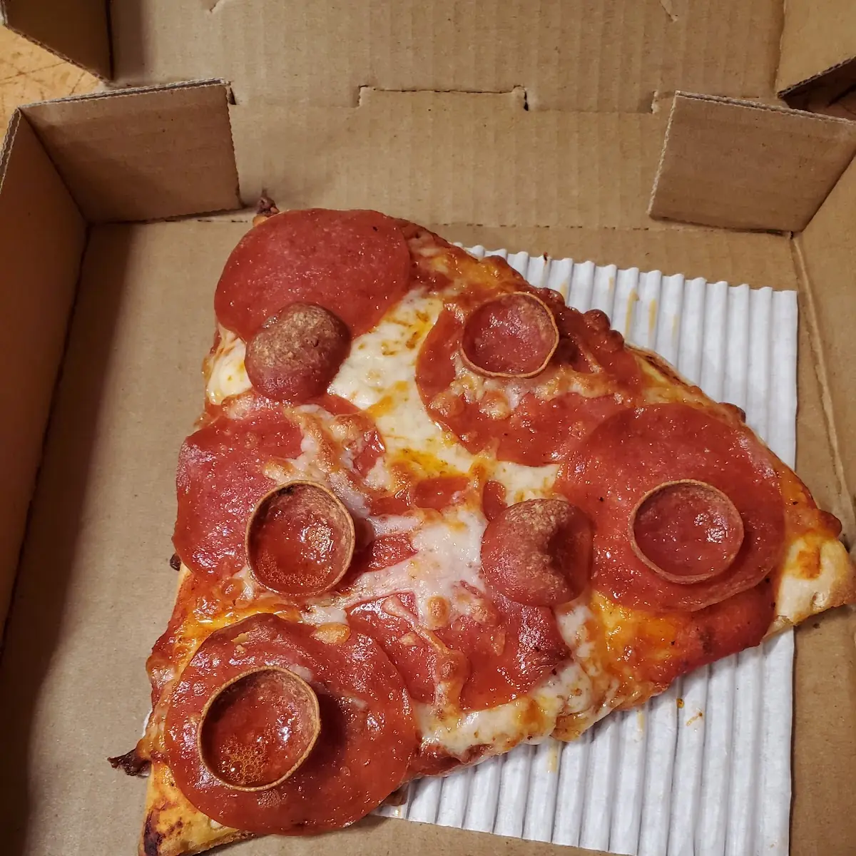 Half Pepperoni Half Pepperoni and Mushroom Pizza