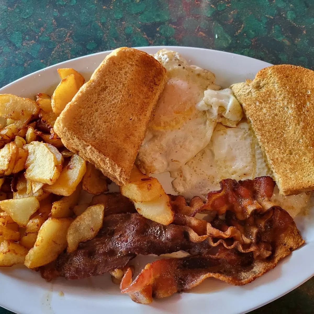 2 Eggs Bacon Home Fries and Toast