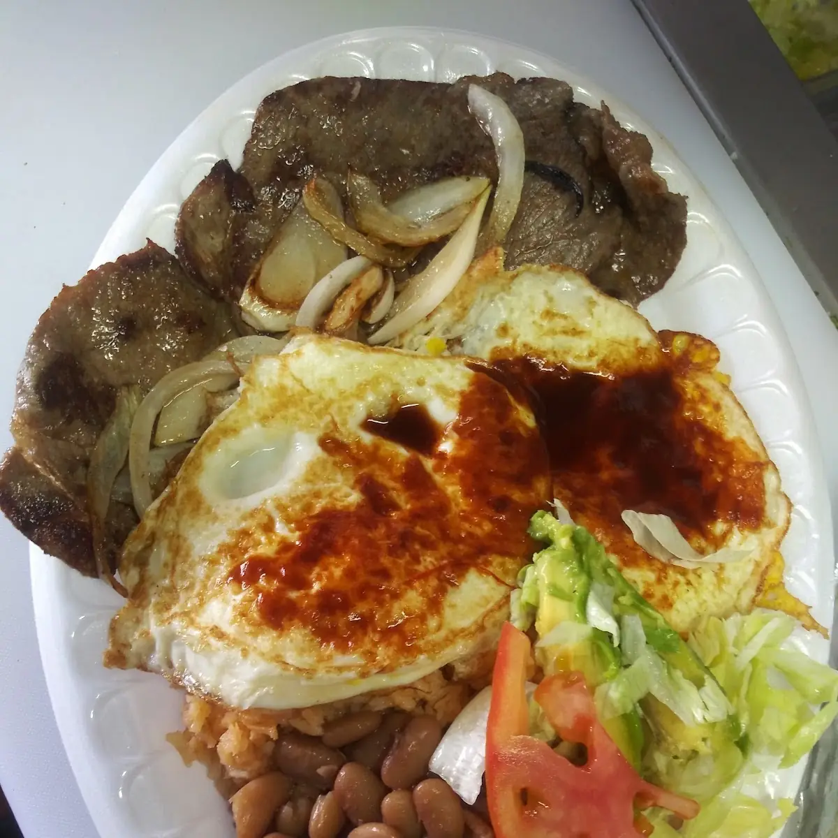 Bistec Encebollado