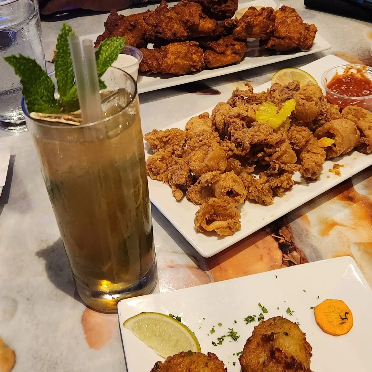 Conch Fritters Hand Breaded Calamari Fried Chicken