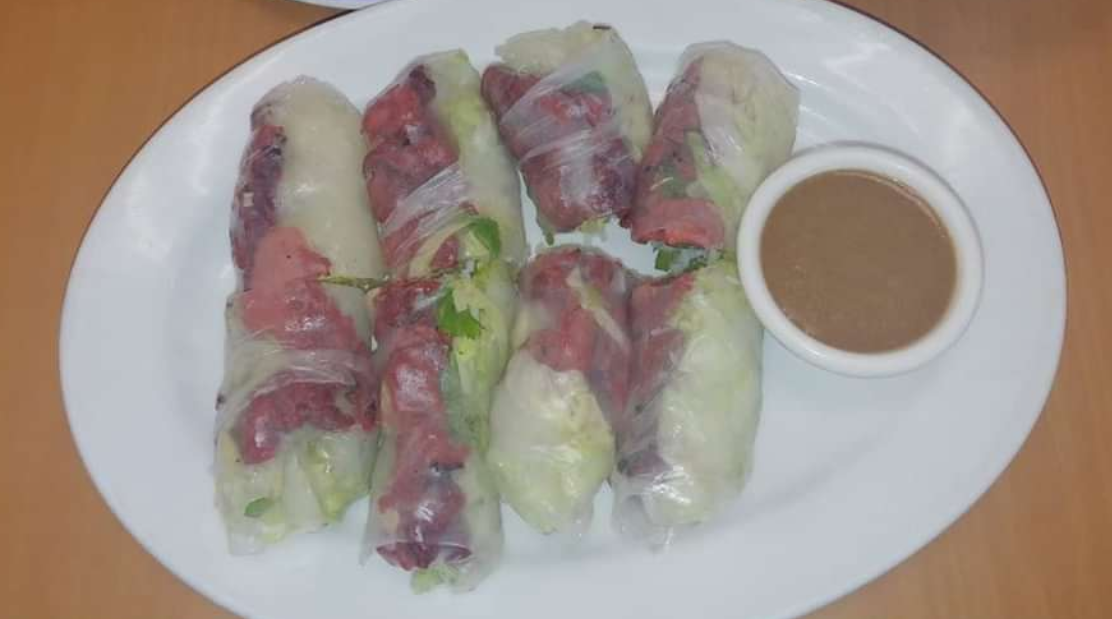 BBQ Pork Spring Rolls with a Peanut Dipping Sauce