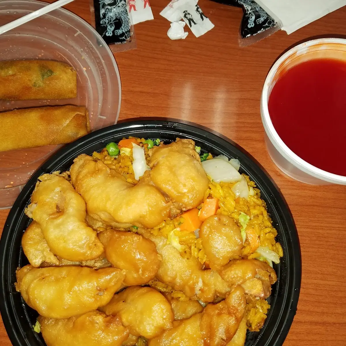 Sweet and Sour Chicken Vegetable Fried Rice and Spring Rolls