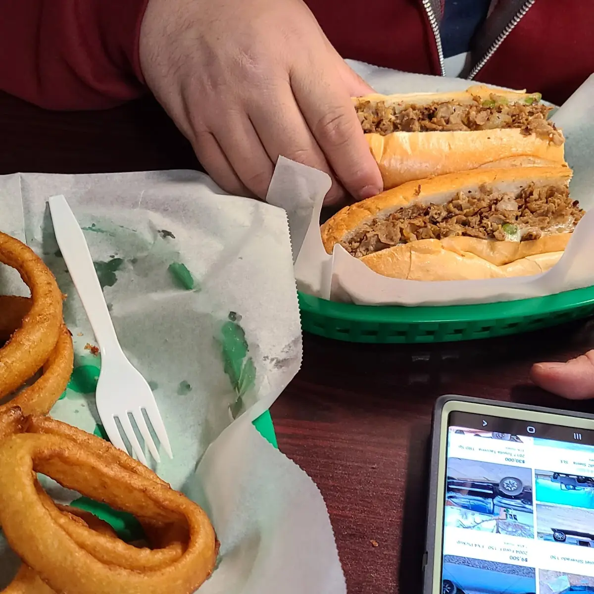 Traditional Philly Cheesesteak and Onion Rings