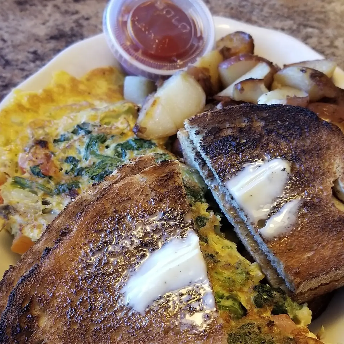Vegetable Omelette Home Fries and Rye Toast