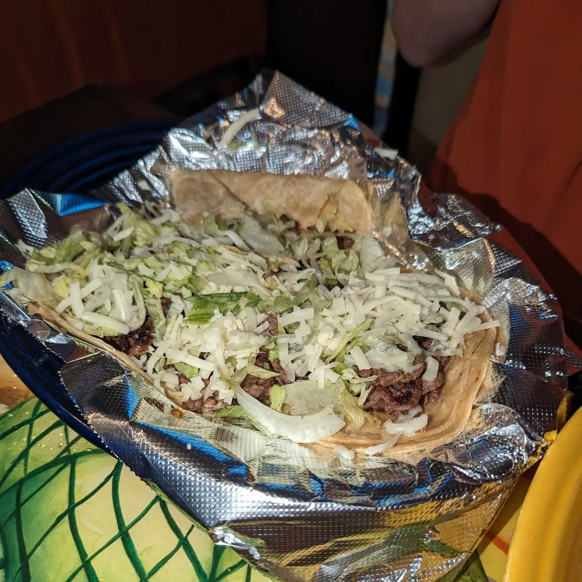 Shredded Lettuce and Cheese Steak Tacos