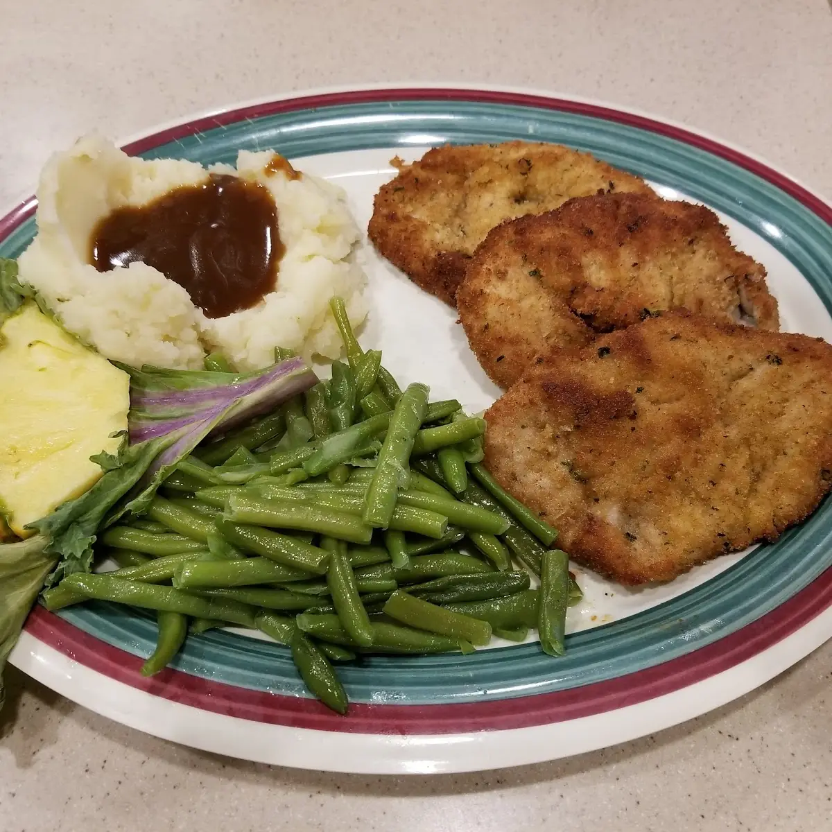 Breaded Pork Tenderloin with Mashed Potatoes and Gravy