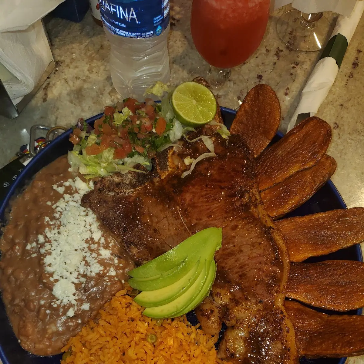 T-Bone Steak and Rice and Beans