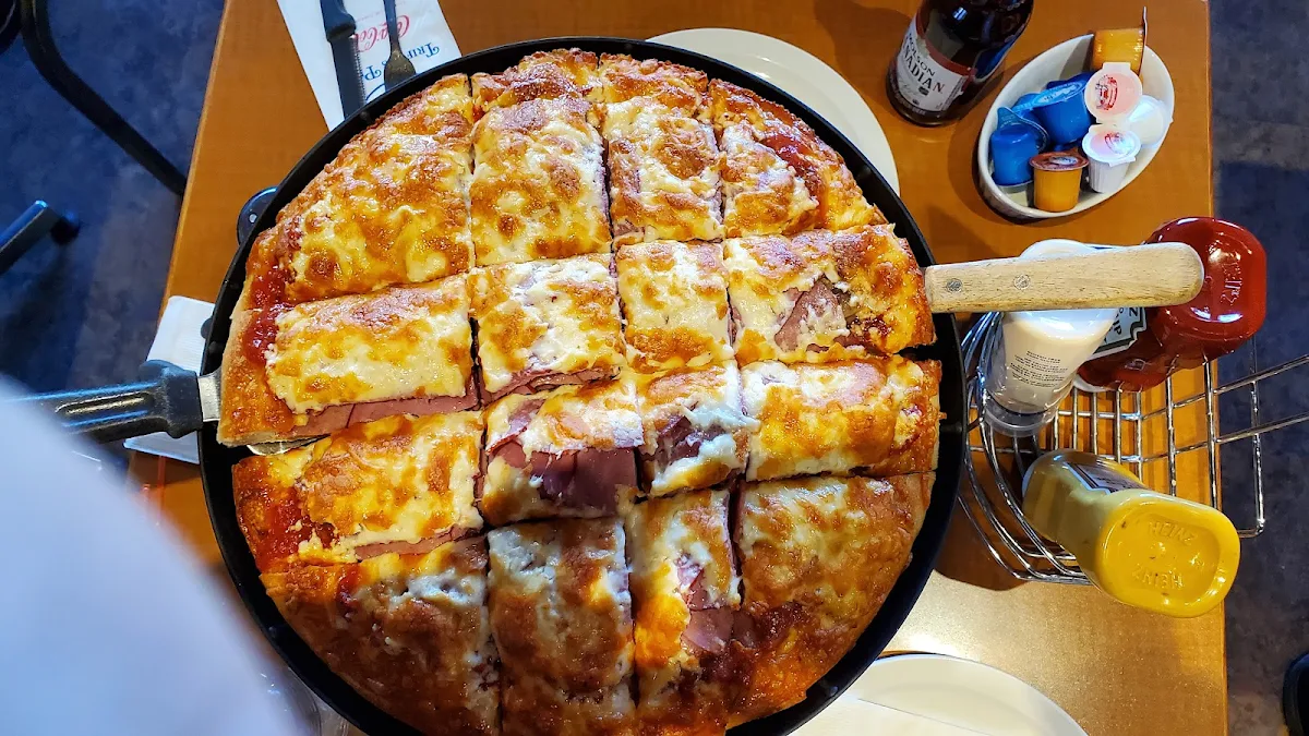 Bacon, Mushroom, and Sausage Pizza