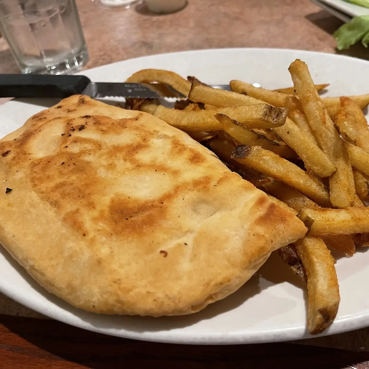 Our Famous Pizza Turnover with Fresh Cut Fries