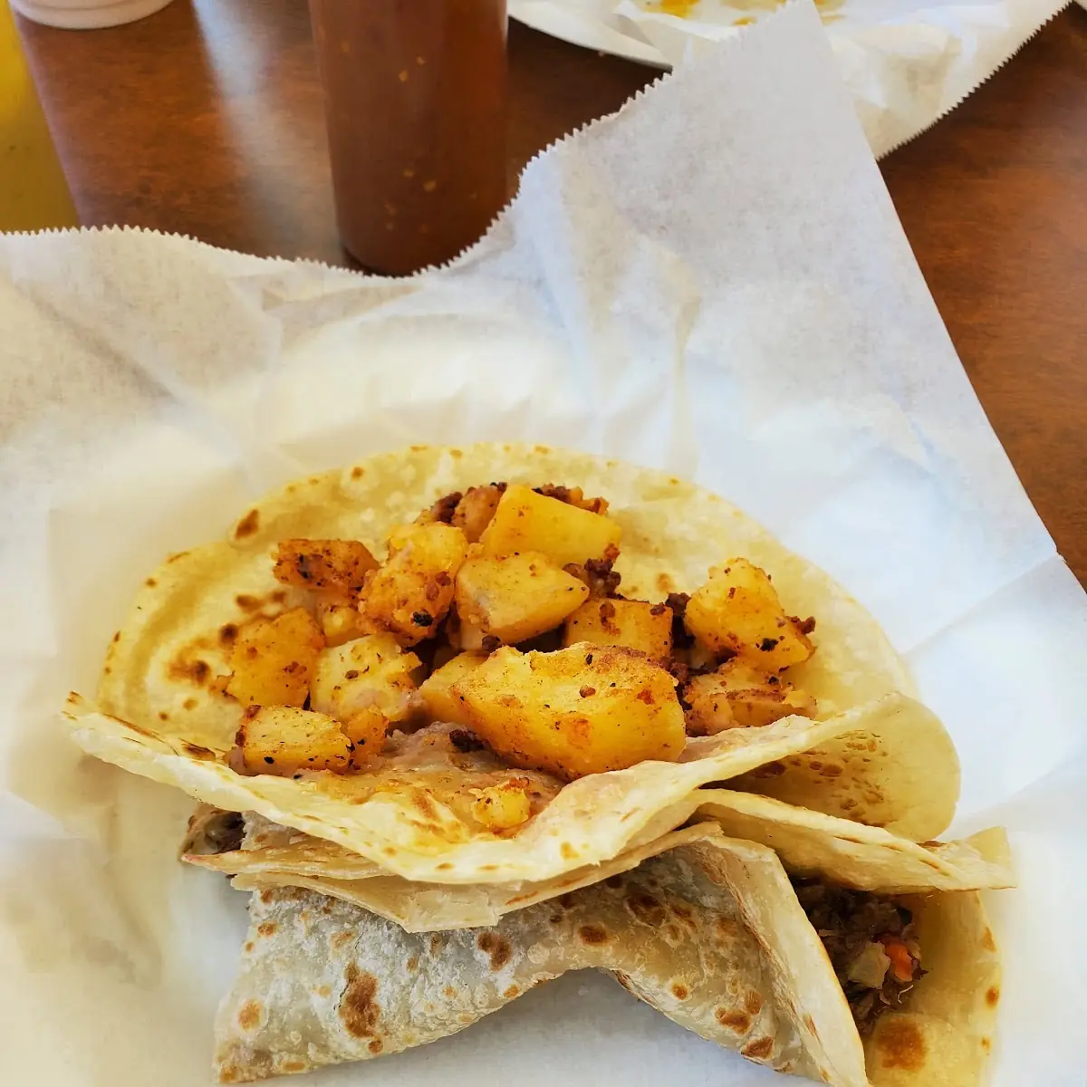 Papas Y Chorizo Taco with Beans