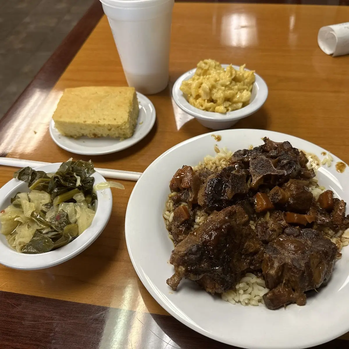 Oxtails Mac and Cheese Collard Greens Cornbread