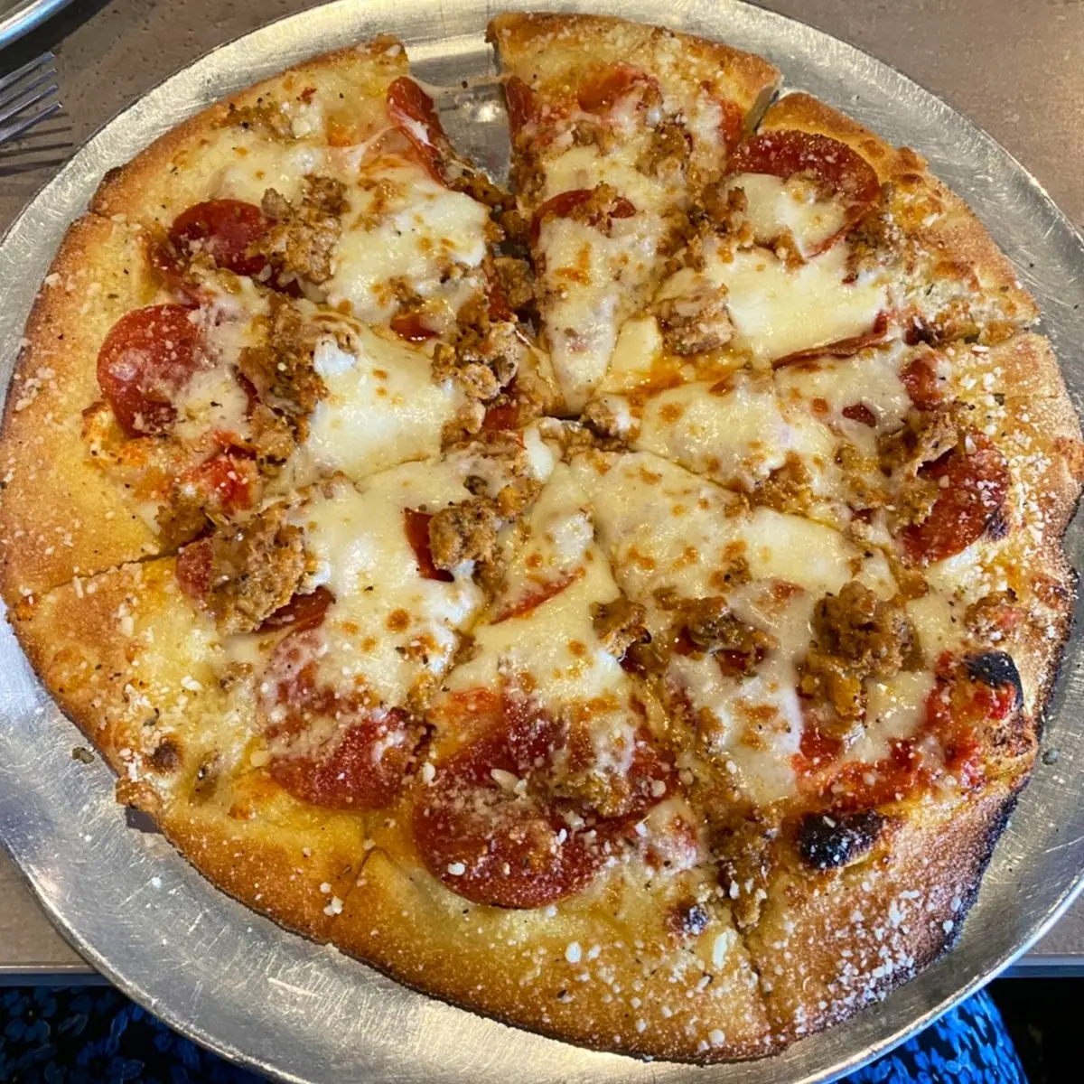 Thin Crust Sausage and Tomato Pizza