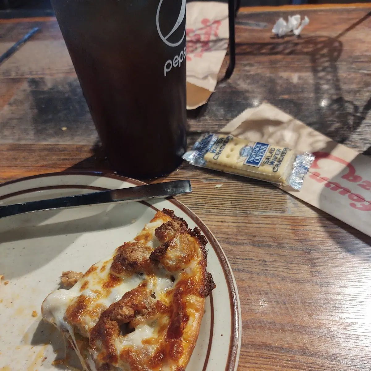 Pizza with Sausage and Pepperoni Pizza Slice