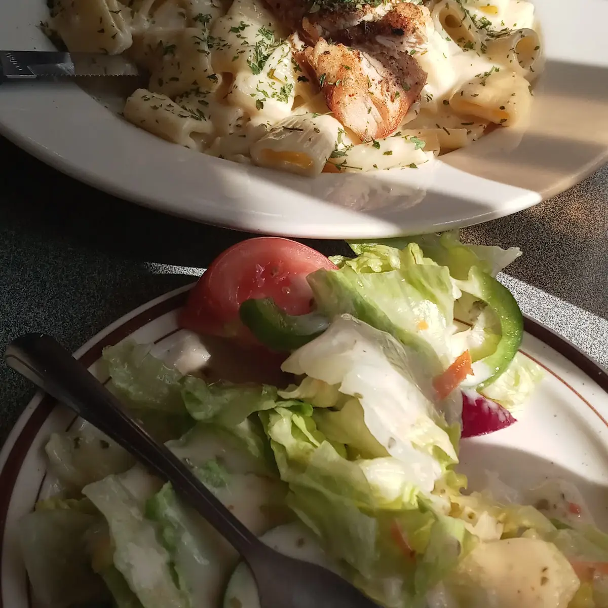 Chicken Alfredo Their Side Salad with Unripened Tomatoes