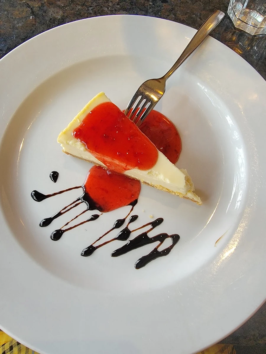 Cheesecake with Strawberry Sauce, Valens Restaurant Inc
