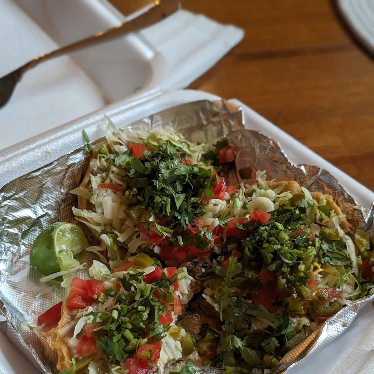 Sopes with Beans Tomatoes and Pickled Jalapeños