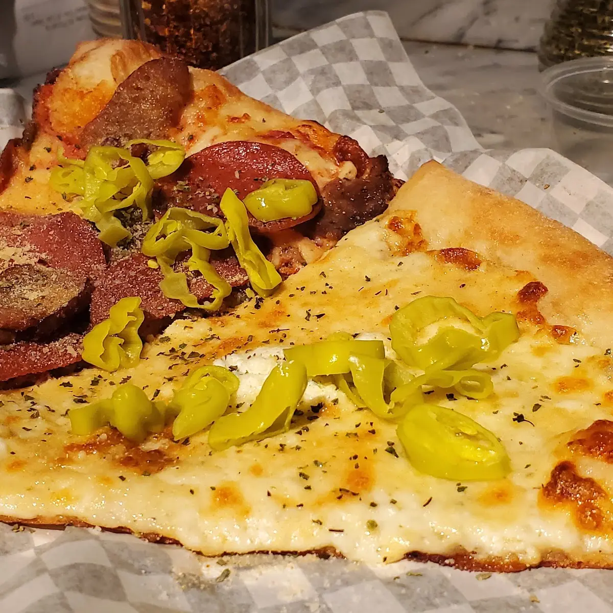 Pepperoni and Sausage Pizza Slice
