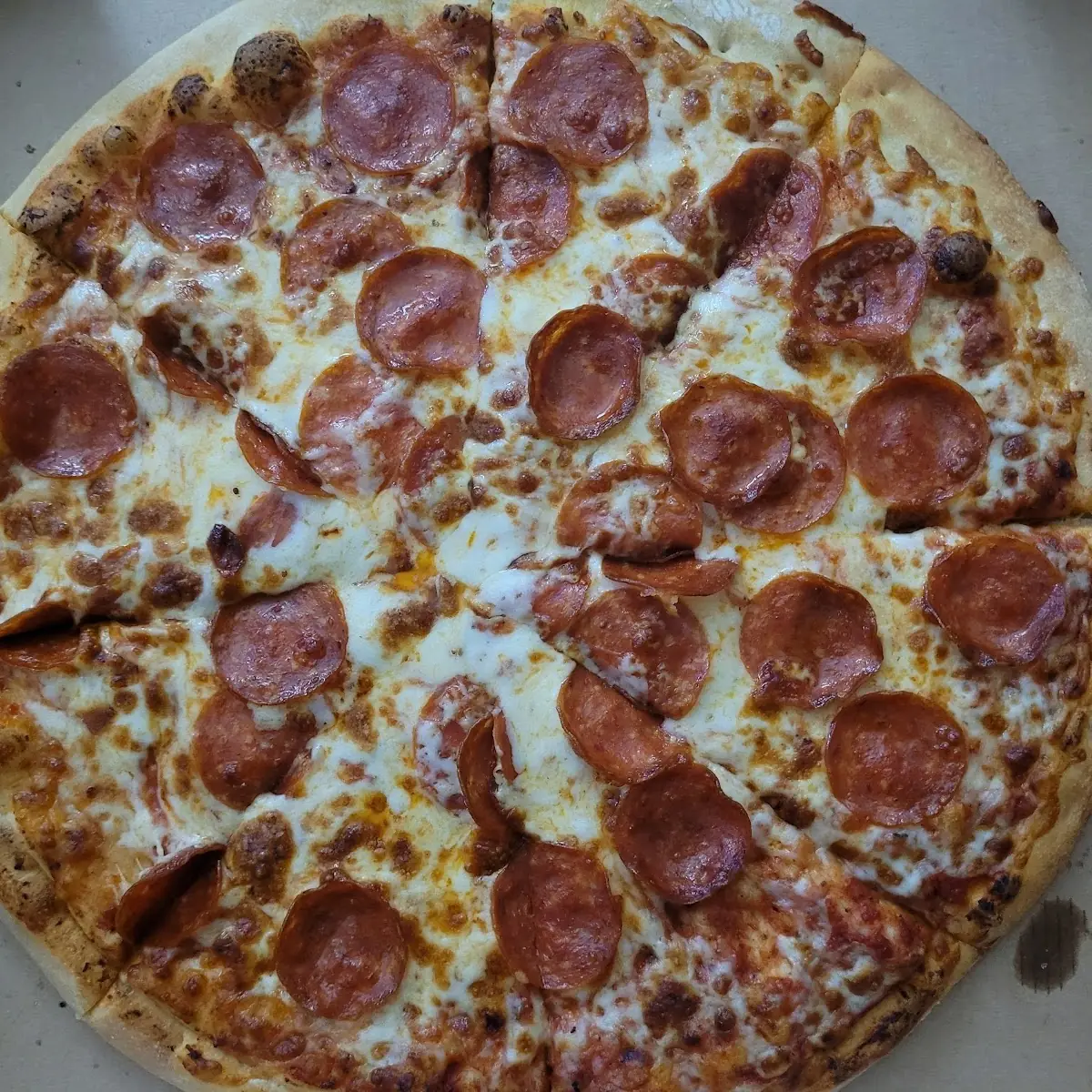 Handmade Pan Pizza Pepperoni and Jalapeños