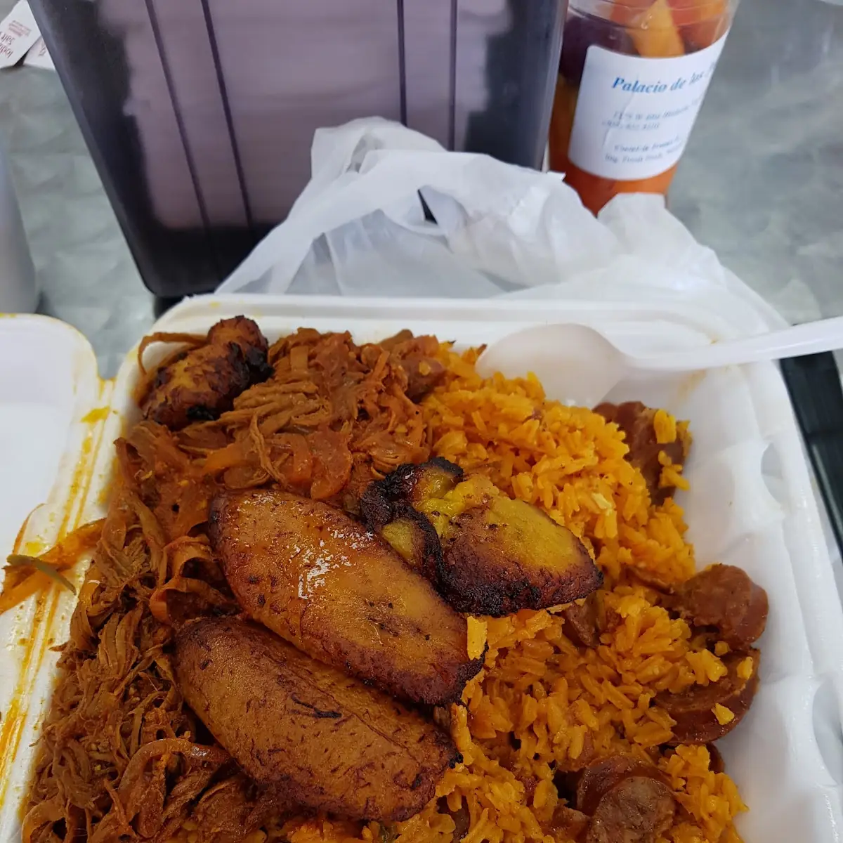 Yellow Rice with Fried Plantains and Pork Chunks