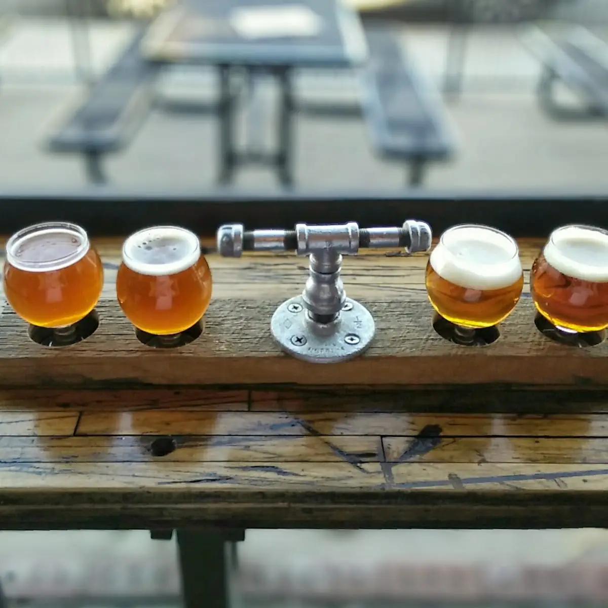Craft Beer Flight on Wooden Table