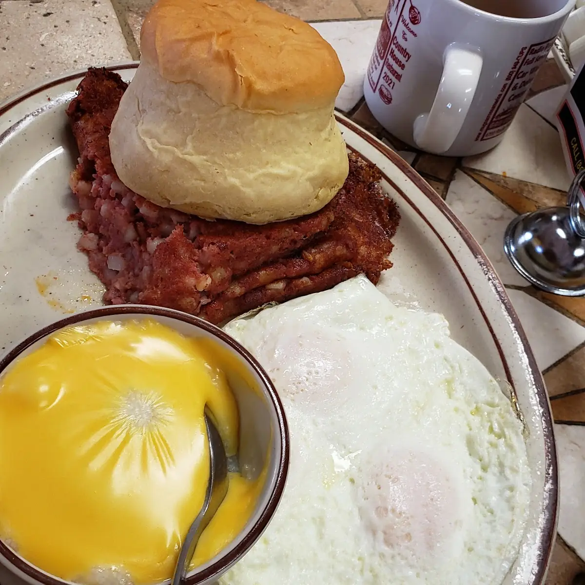 Corned Beef Hash Grits and over Easy Eggs