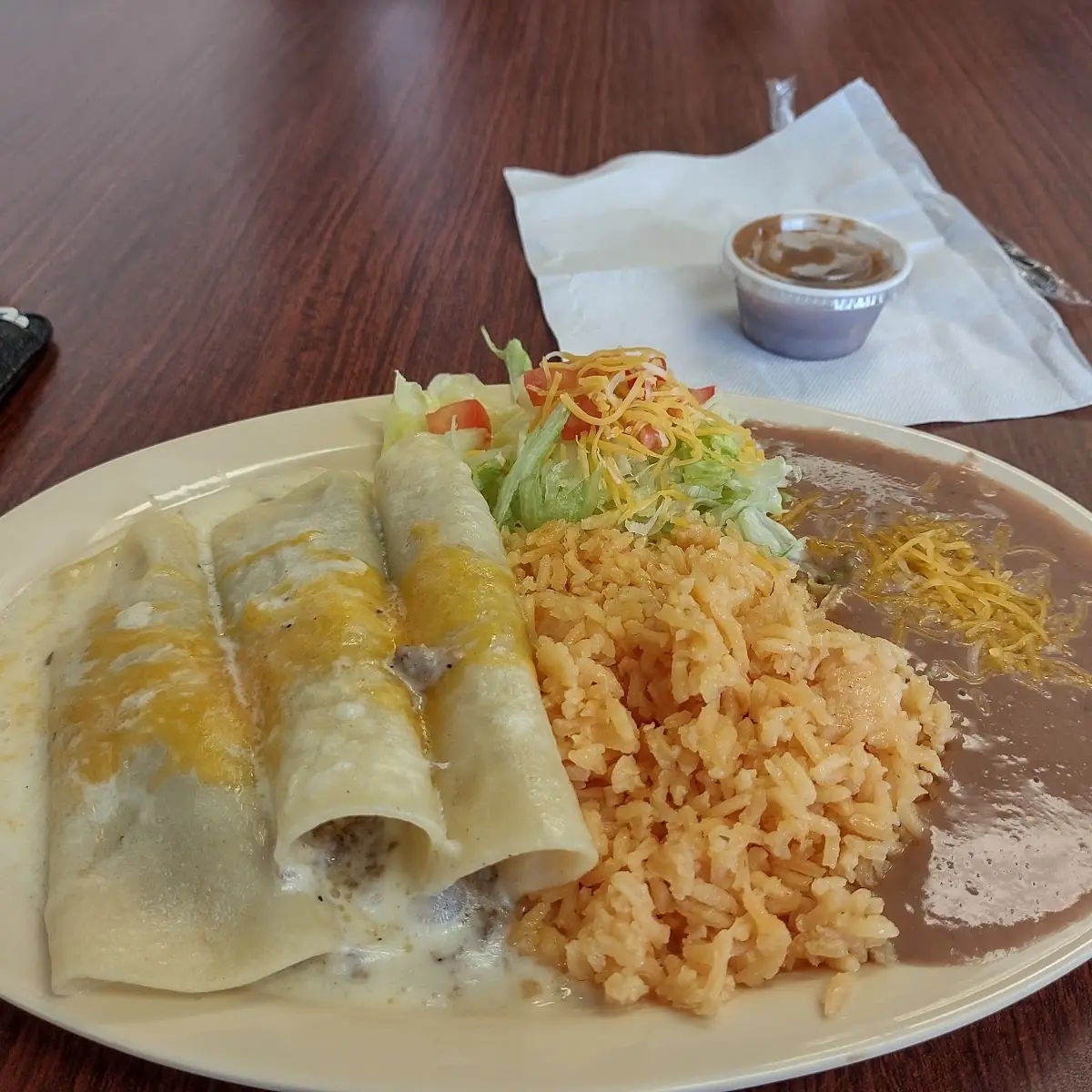 Chicken Enchilada with Cheese Sauce