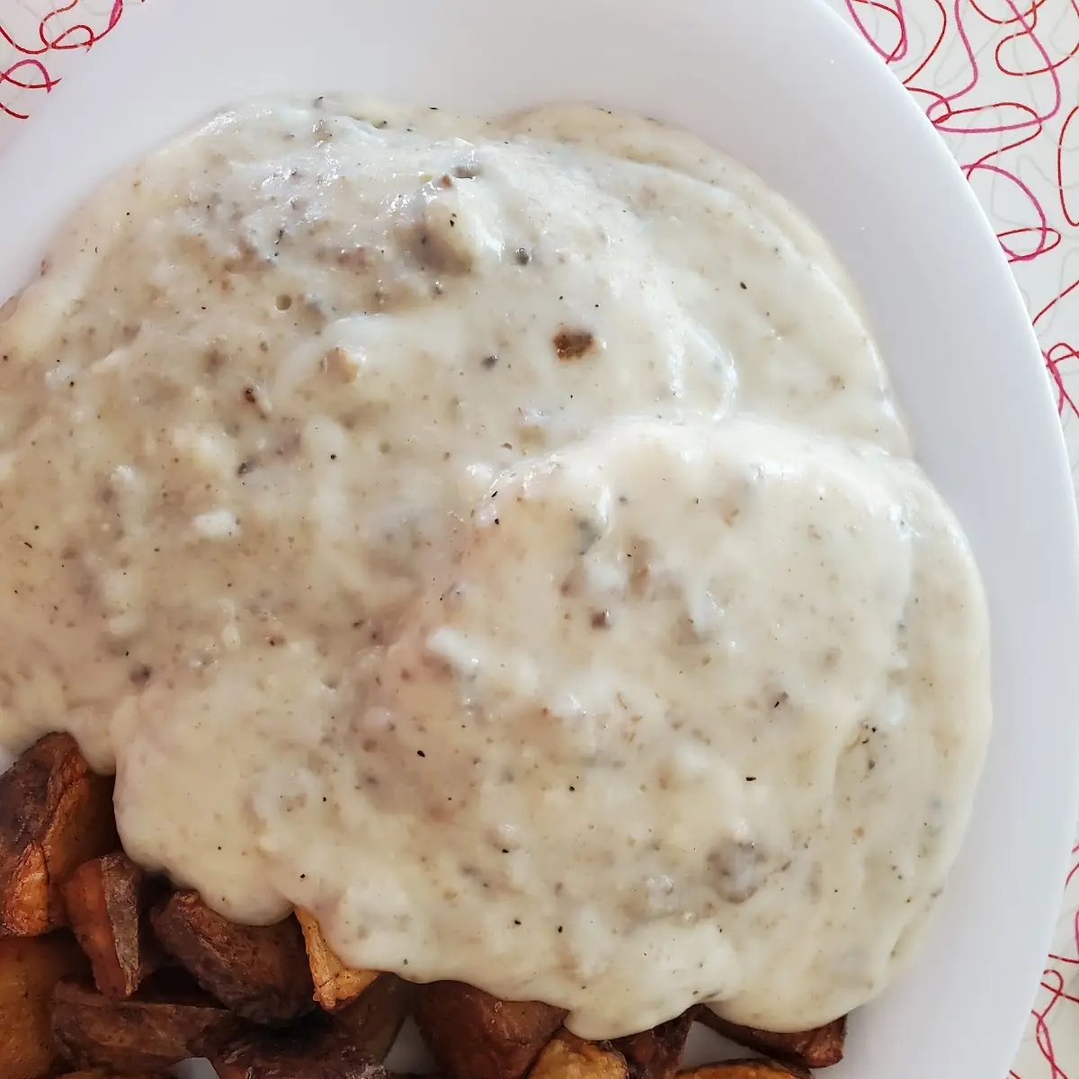 Scrapple Gravy over Biscuits