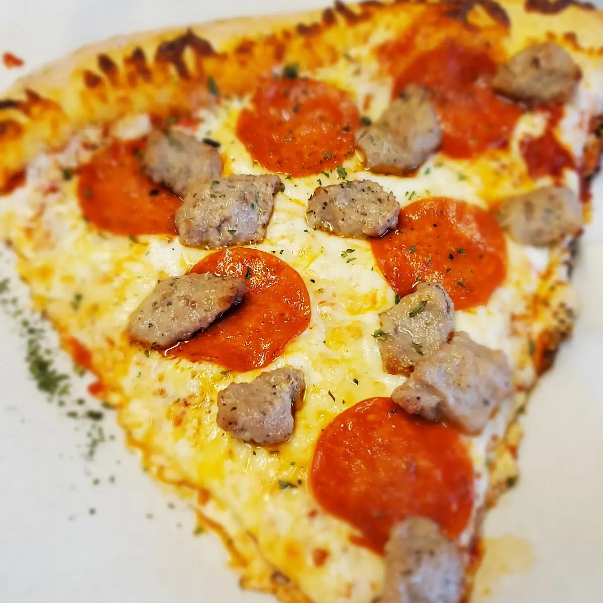 Pepperoni and Sausage Pizza Slice