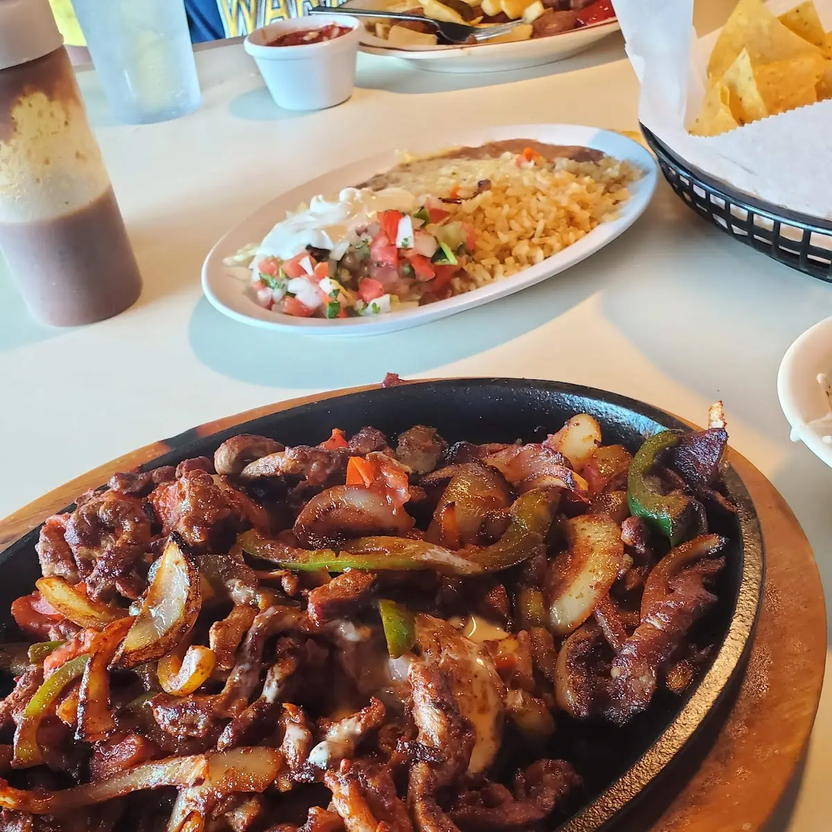 Steak Shrimp Chicken Fajitas