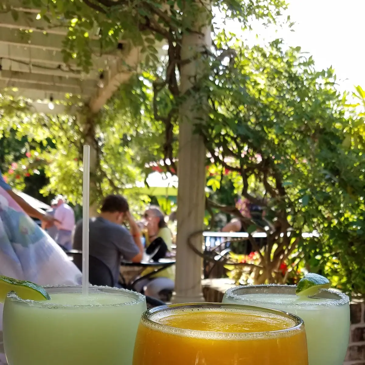 Mango Margarita Surrounded by Two Friends