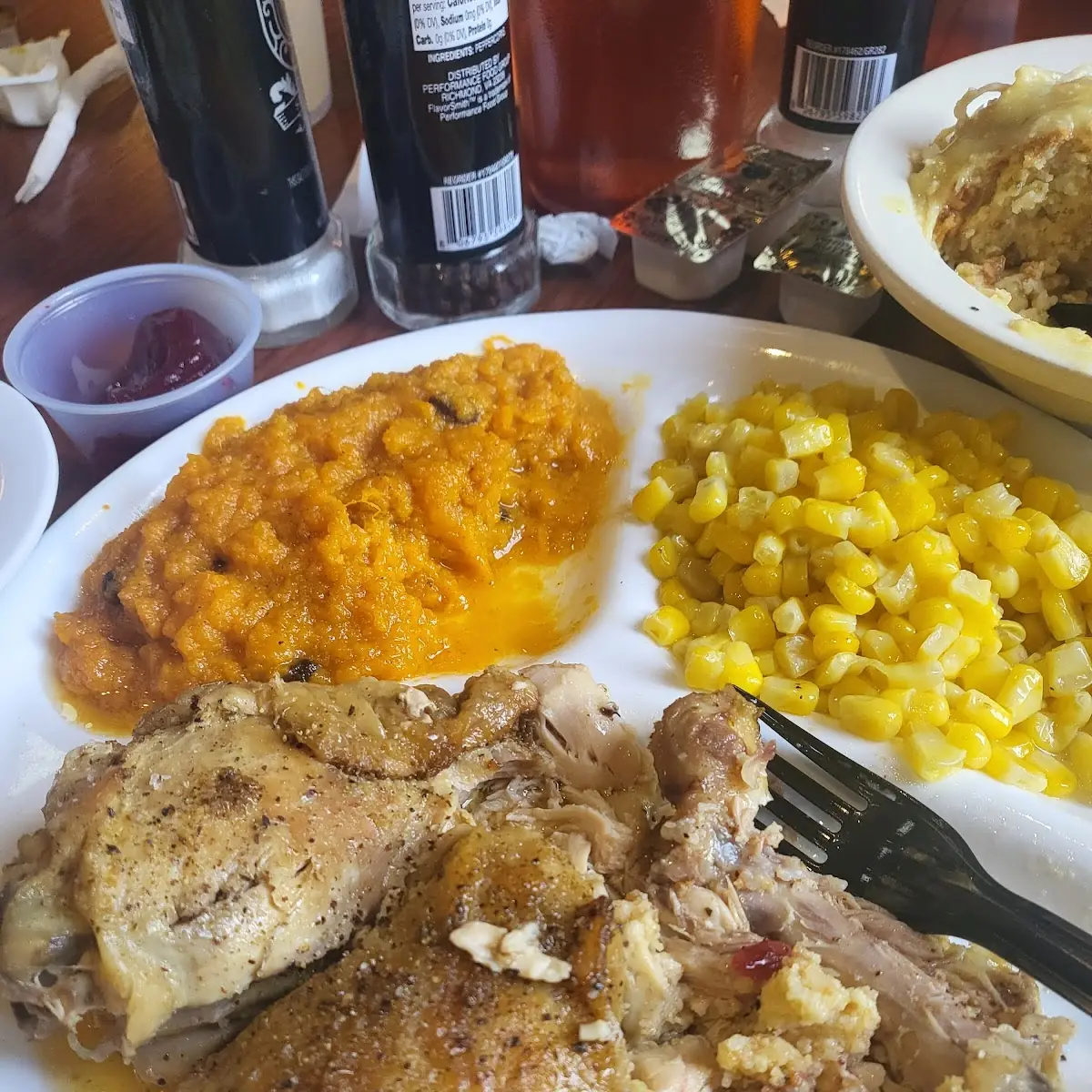 Baked Chicken with Corn Bread Dressing Sweet Potatoes Casserole and Corn