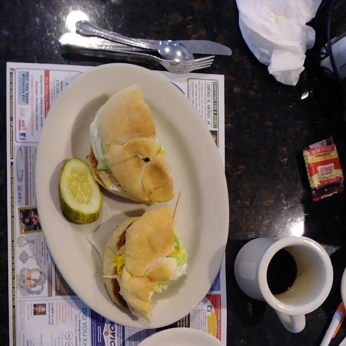 Just a Fried Egg Sandwich on a Kaiser Roll w Lettuce Tomato & Raw Onion
