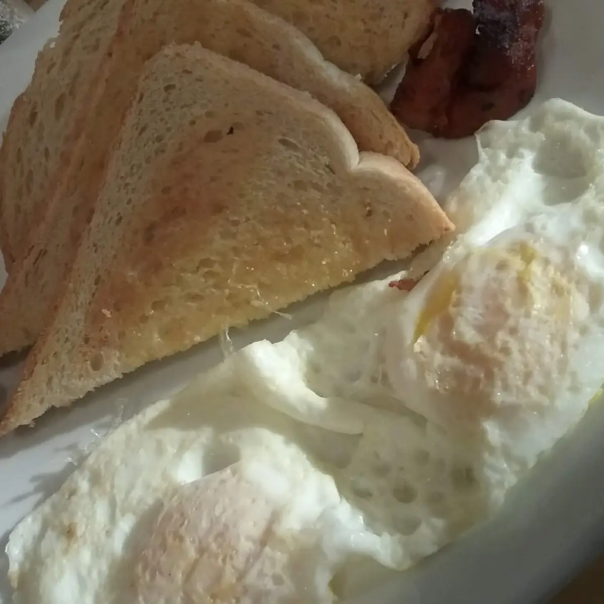 2 Eggs over Easy Bacon Sourdough Toast