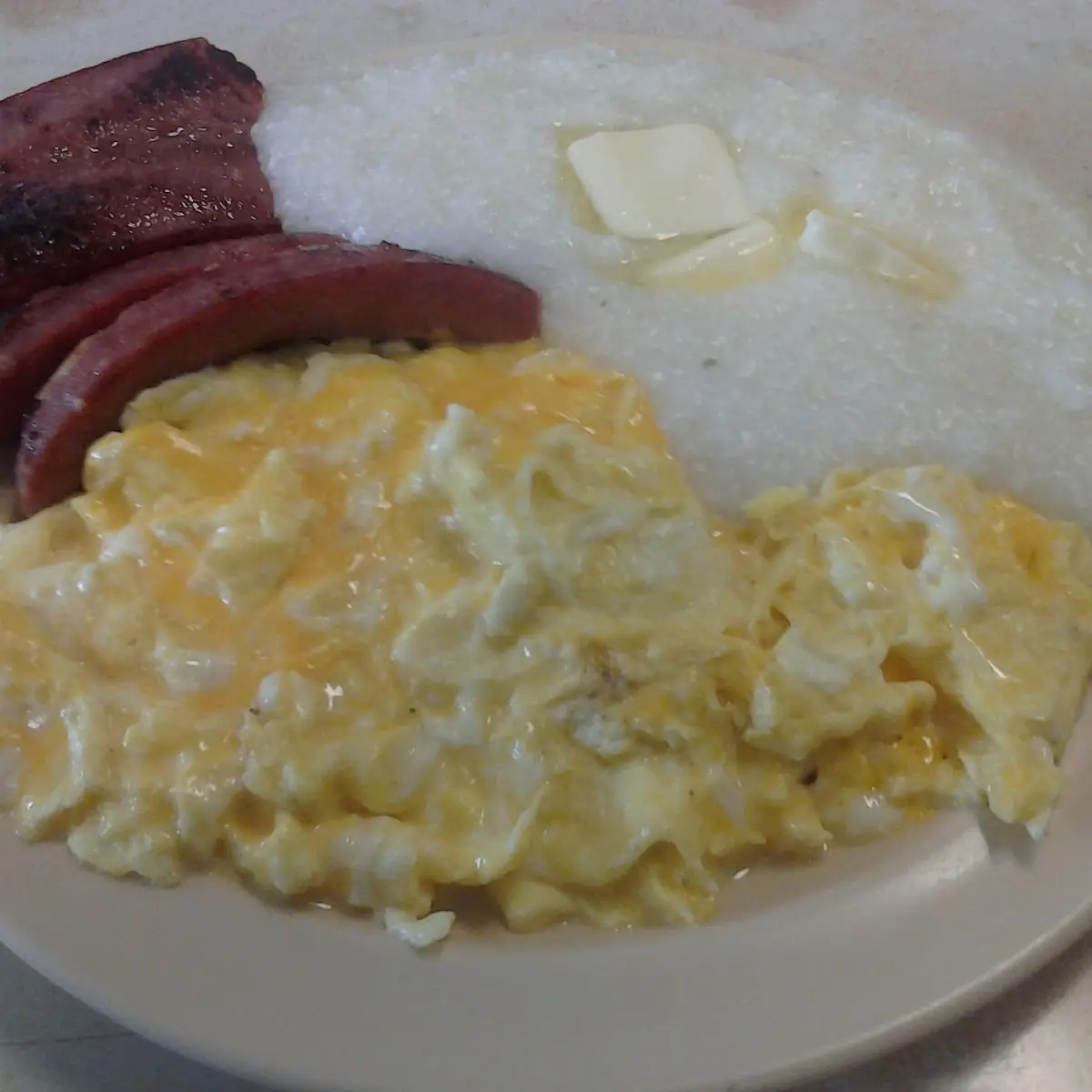 Cheesy Scrambled Eggs with Grits