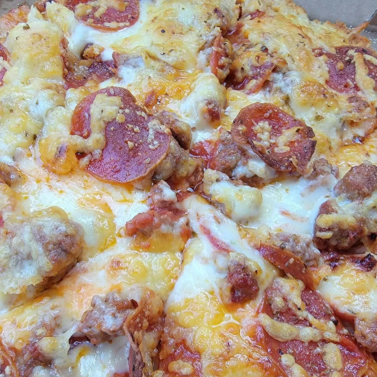 Thin Crust Pizza Sausage and Pepperoni Pizza