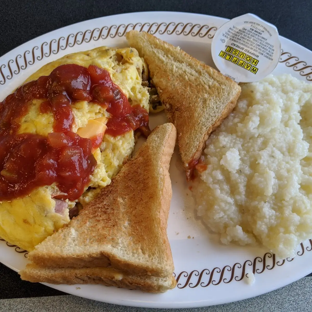 Fiesta Omelette with Grits & Toast