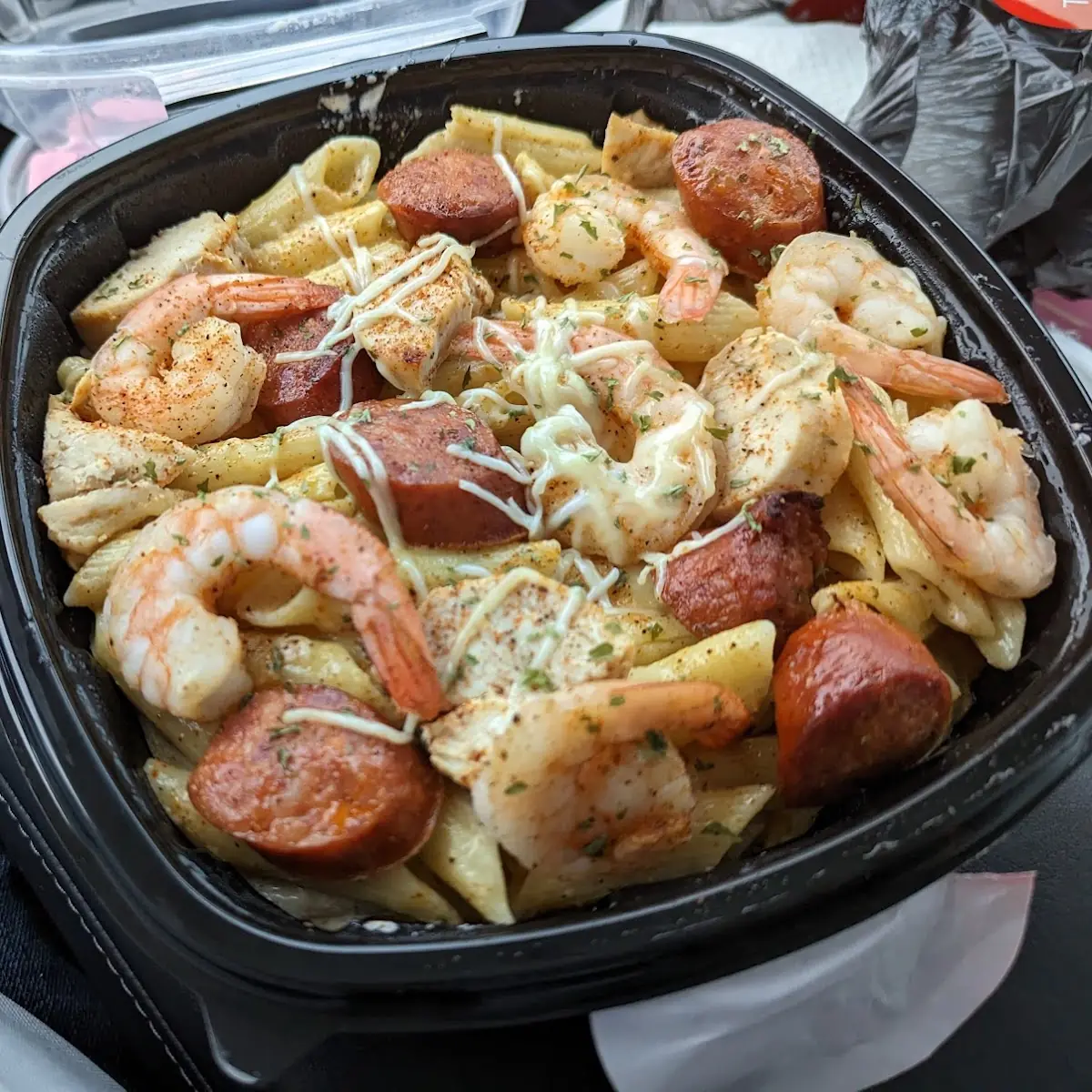 Half Pan Cajun Chicken Pasta with Salad and Bread Stick