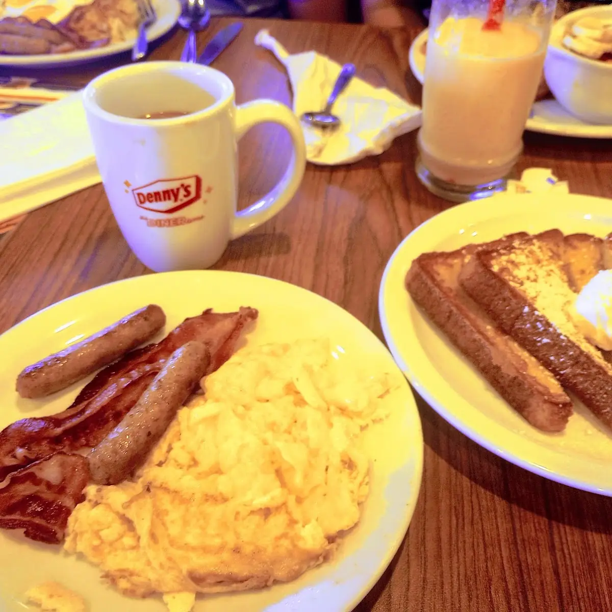 French Toast Platter with Sausage Bacon and Scrambled Eggs