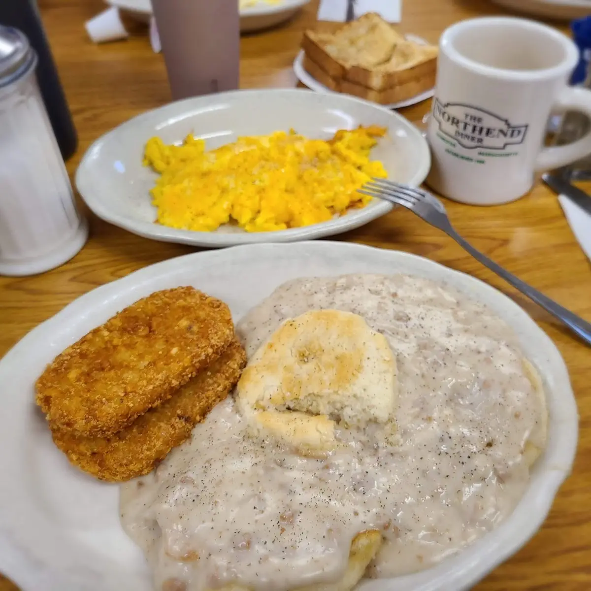 Biscuits and Sausage Gravy with Scrambled Eggs and Coffee