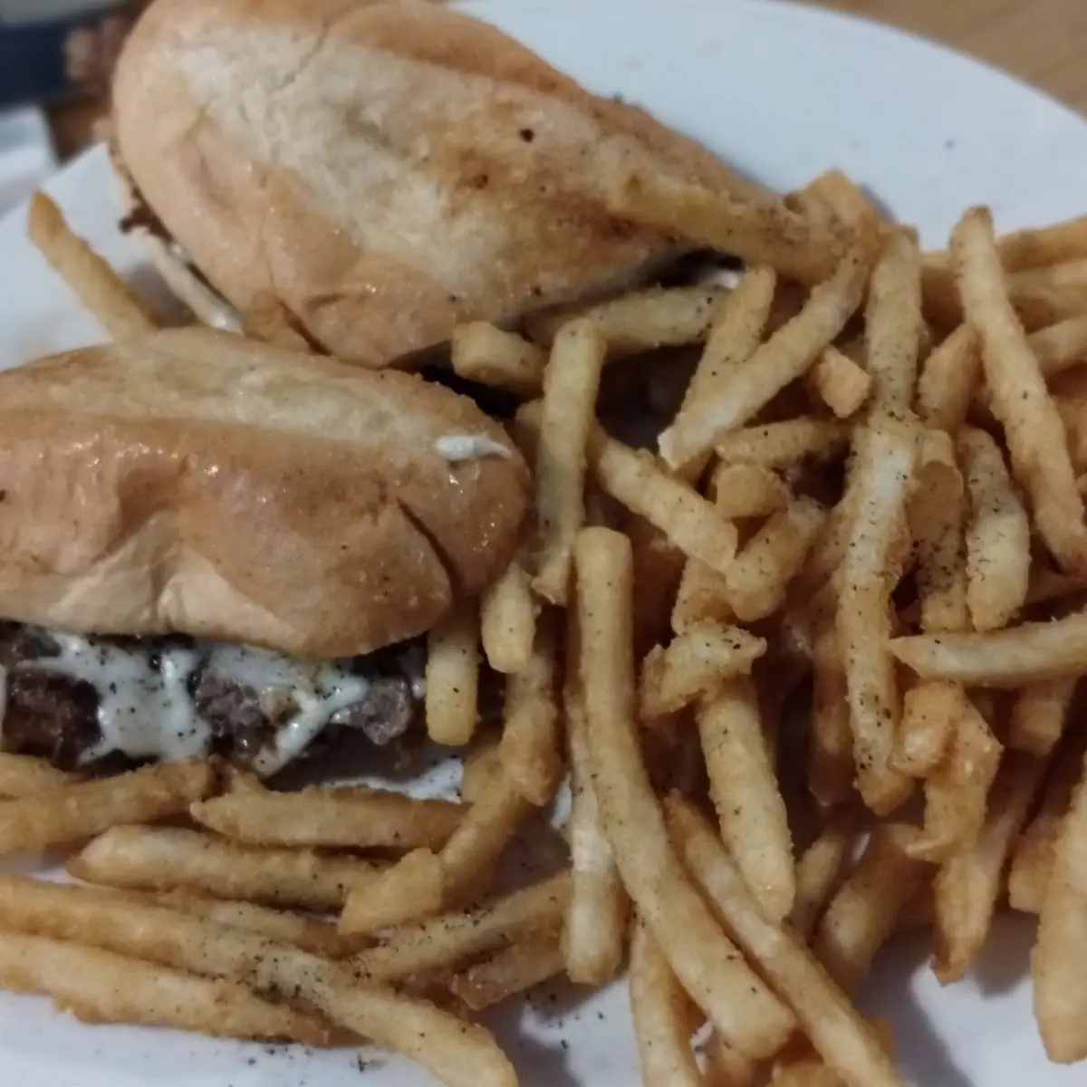Philly Cheese Steak Sandwich and Fries