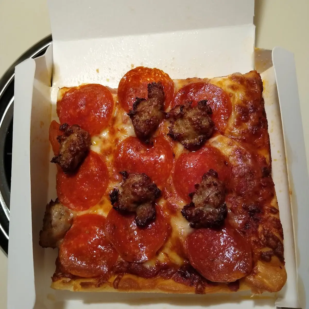 Sausage and Pepperoni Pizza Slice