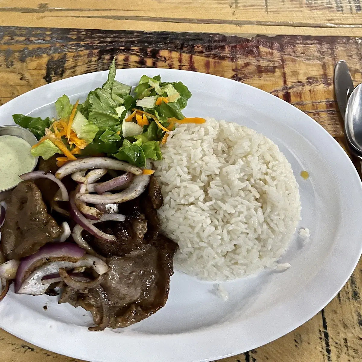 Bistec with Onions White Rice and Salad