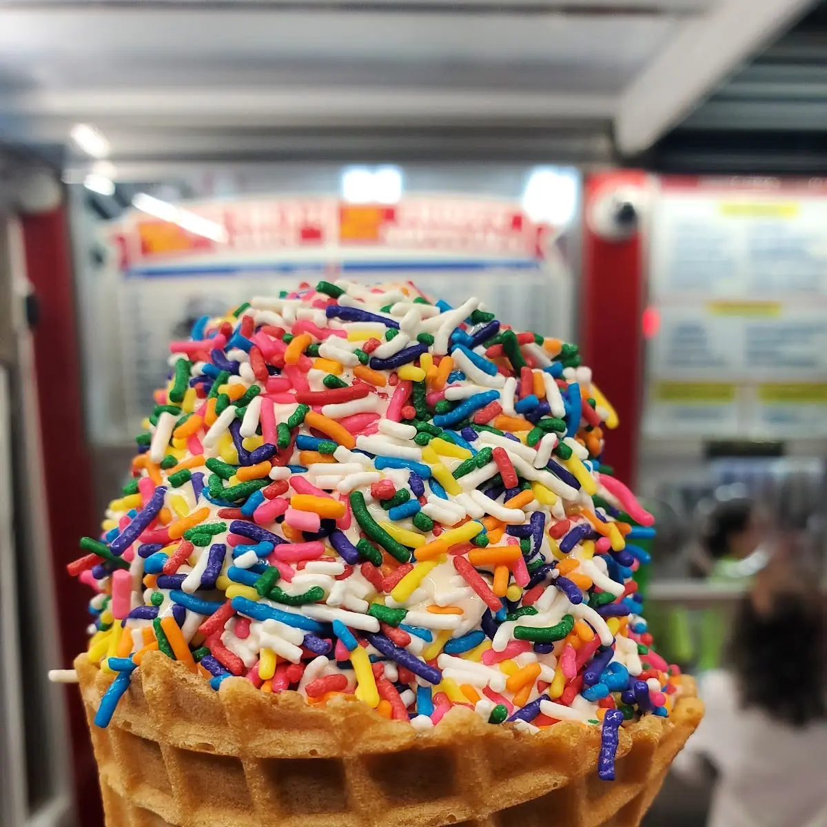 Pumpkin Waffle Cone with Rainbow Sprinkles