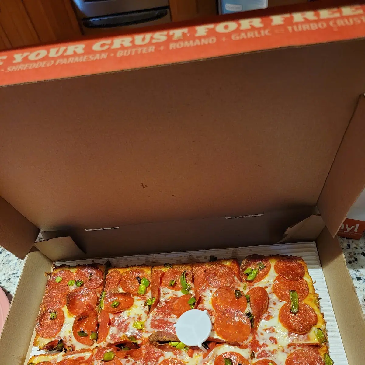 Large Deep Dish Pizza with Double Pepperoni and Green Peppers
